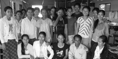 Group of people of Asian descent smiling