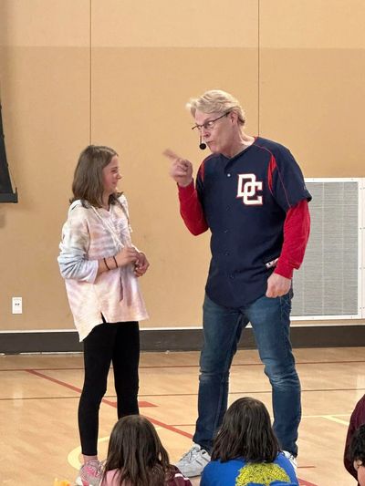 Children's Author Daryl Cobb performing "The Cookie Caper" during his Author Visit assembly.
