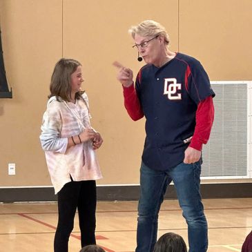 Children's Author Daryl Cobb performing "The Cookie Caper" during his Author Visits assembly.