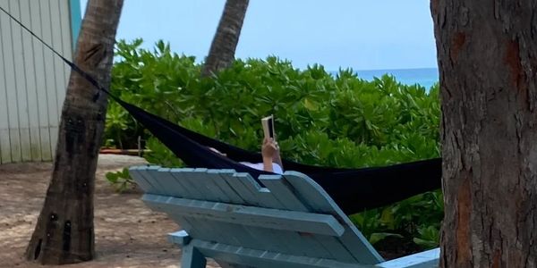 Client relaxing at beach