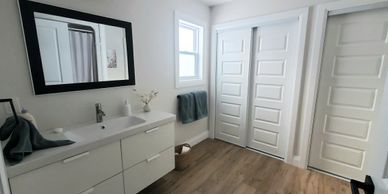 master bathroom with double closets