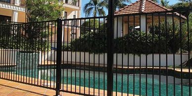 Aluminium pool fence installed to standard and and looks the part in black to enhance the landscape