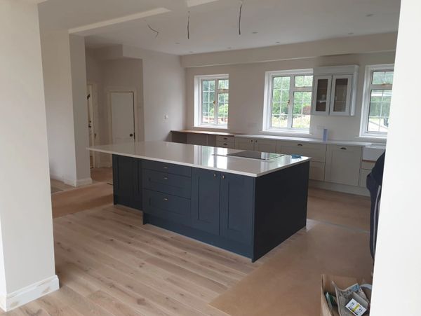 Kitchen renovation with middle kitchen cabinets
