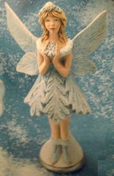 Snow Flurries Fairy with
Snowflake on Chest
This is about 6" T