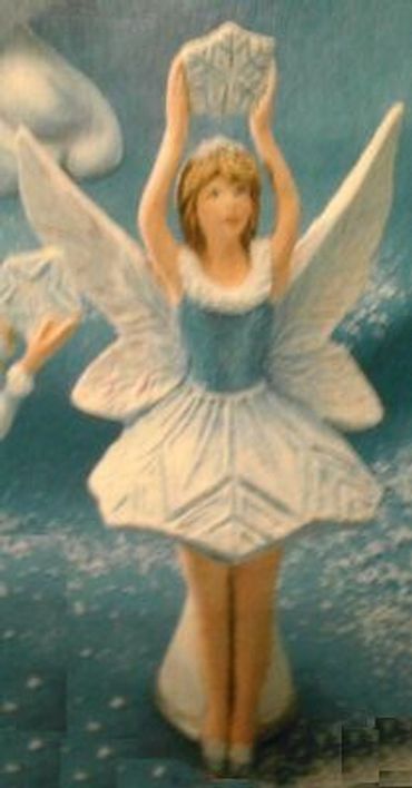 Snow Flurries Fairy with
Snowflake Overhead
This is about 7" T