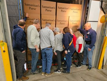 Praying over Samaritan's Purse Shoeboxes