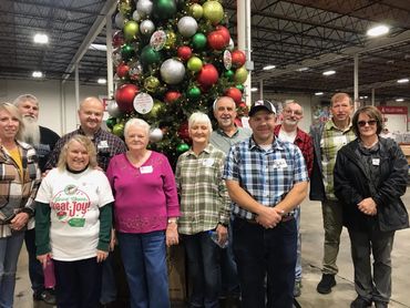 UPBC Group in front of the Christmas tree @ Samaritan's Purse "Operation Christmas Child"