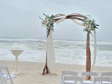 Multiple piece driftwood wedding arch for beach weddings. wedding rentals Gulf Shores, Alabama.