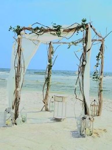 Beautiful 8 poster driftwood wedding arbor.  Custom arbor for rent in Gulf Shores and Orange Beach.