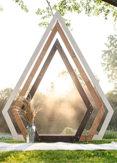 Geometric Boho wedding arch. Modern arch with multi colored diamond shapes. Beautiful Wedding rental