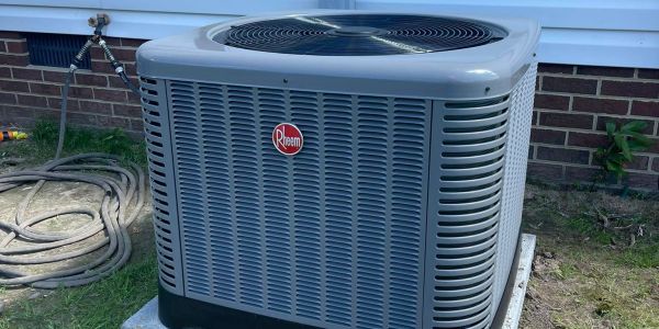 Air conditioning unit outside a house.