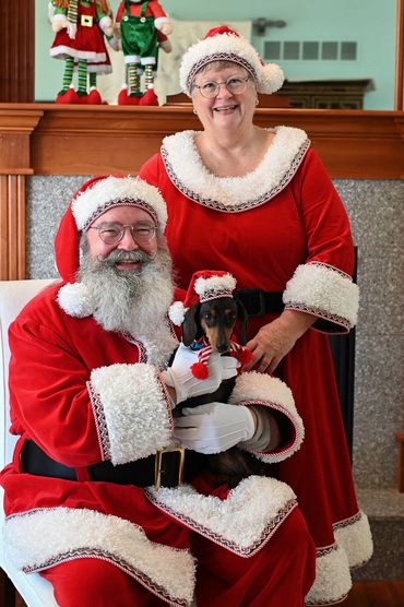 Santa, Mrs. Claus, and Elf dog Gunther