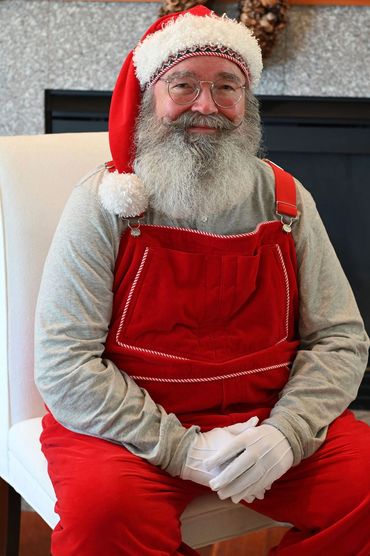 Santa in red overalls