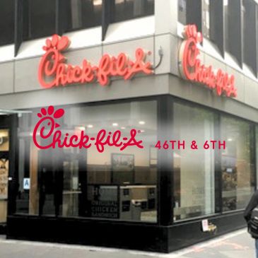 Chick-fil-A restaurant on a street corner.