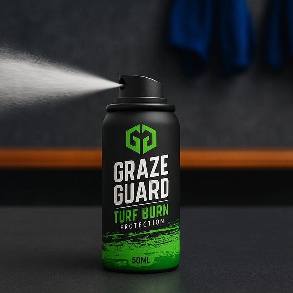 Black and green spray can labeled Graze Guard Turf Burn Protection spraying mist.