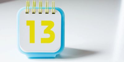 A desk calendar showing the number 13.