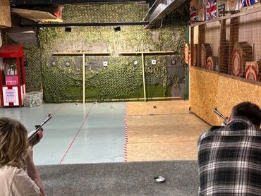 couple shooting guns at white wolf activty centre Huddersfield
