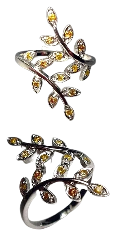An 18kt White Gold Leaf Ring
set with Yellow Diamonds
