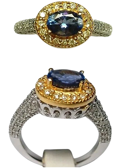 An 18kt Yellow & White Gold Ring
set with Diamonds
& a Blue Sapphire
