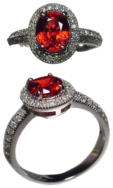 An 18kt White Gold Ring
set with a Red Songhea Sapphire