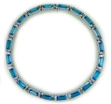 Silver Aztec Necklace
set with Blue Topaz