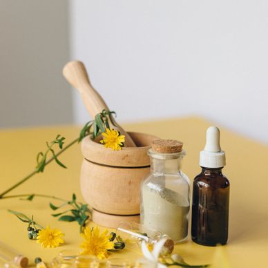 herbs in a mortar and pestle