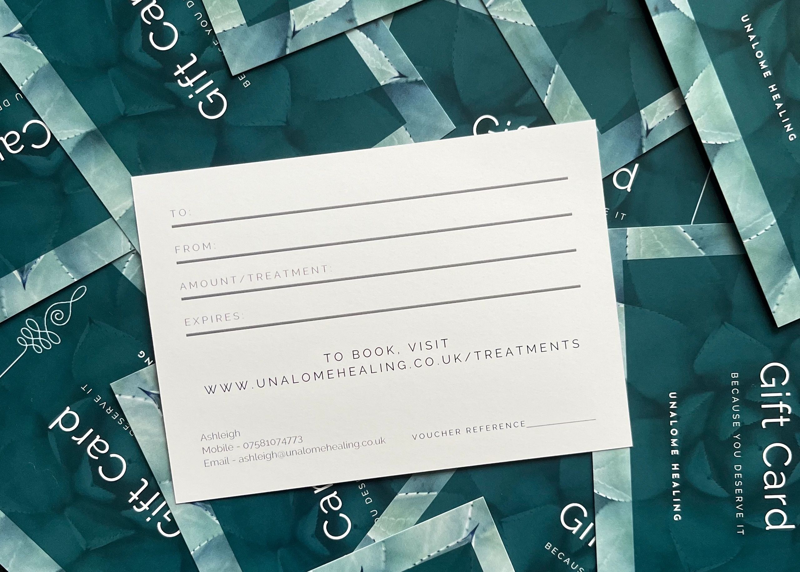 Gift cards and a gift voucher for Unalome Healing services.