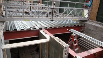 Pan decking over structural steel red iron