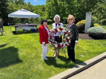 Three people taking picture