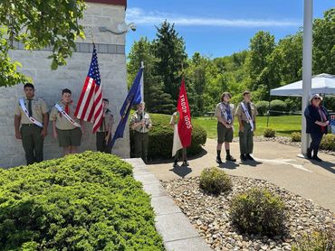 group of kids standing one after another