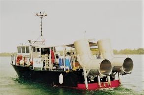 Treasure salvage ship utilizing blowers to look for artifacts. Photo courtesy of CEE Staff.