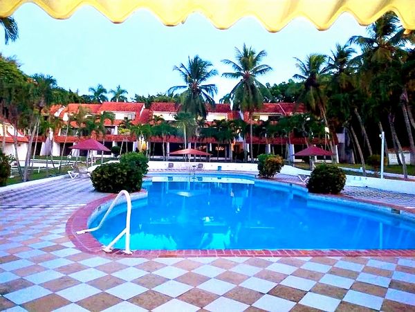 View looking across the beautiful swimming pool to your apartment in Sosua, Dominican Republic