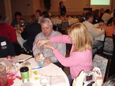a group of people sitting around a table