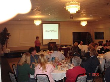 a group of people sitting around a table