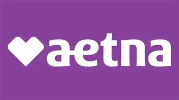 Aetna logo with a heart symbol on a purple background.