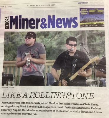 Two musicians perform on stage during Labellapalooza music festival.