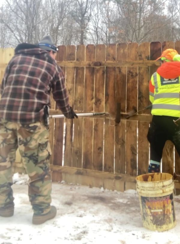 Staining a fence