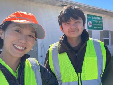 Smiling after delivering trash bags to NCDOT