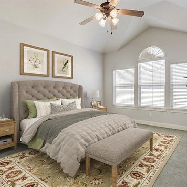 The vaulted ceiling in the primary bedroom adds to the light-and-bright feel.