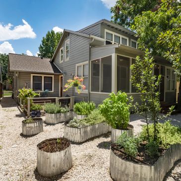 The backyard of this Woodlands Heights home is incredible ... check out the river house vibe!