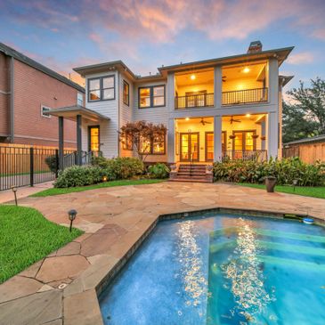 Sited on a double-sized lot, this Houston Heights-area home features an amazing back yard oasis!