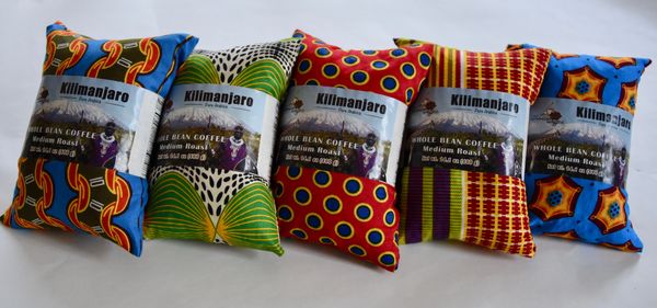 Kilimanjaro Coffee packages wrapped in Kitenge cloth vibrant colored patterns