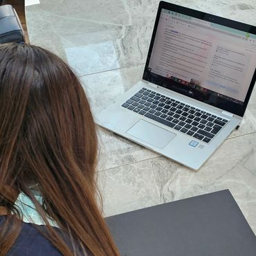 Teenager doing internet research for NCFE in Textiles