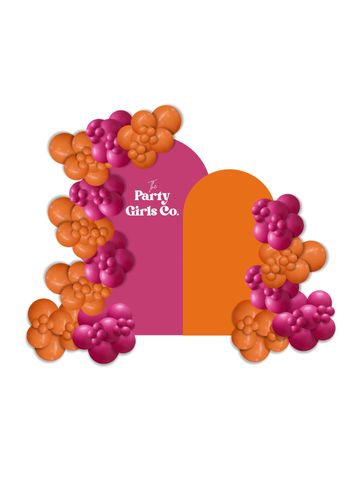 16-ft organic balloon garland with medium and large arch backdrops and a custom decal.