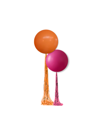 Pair of statement balloon centerpieces with tassel tails in custom colors.