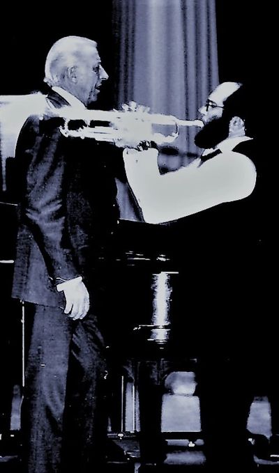 Mike Vax solos as Stan Kenton leads the orchestra.