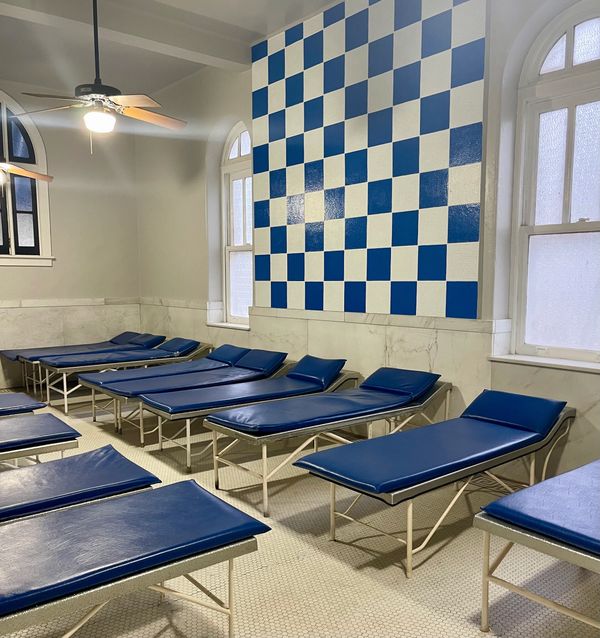 Blue and white cooling room located on the first floor men's area at Buckstaff Bathhouse.