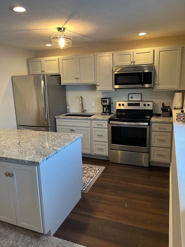Kitchen with Quartz Countertops. Remodel and Renovations.