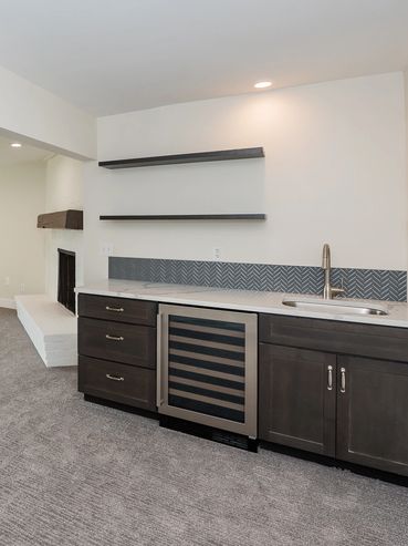 Downstairs Playroom / Recreation Room with Kitchenette and Wine Fridge. Remodel and Renovations.