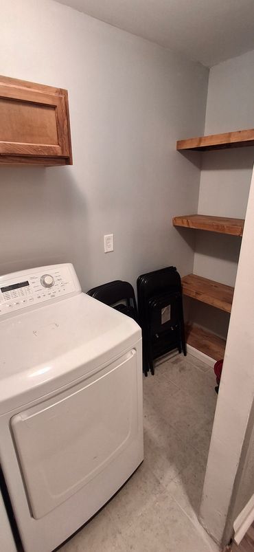 Laundry room with large-capacity washer and dryer. Scheduled resident use. No coin operation.